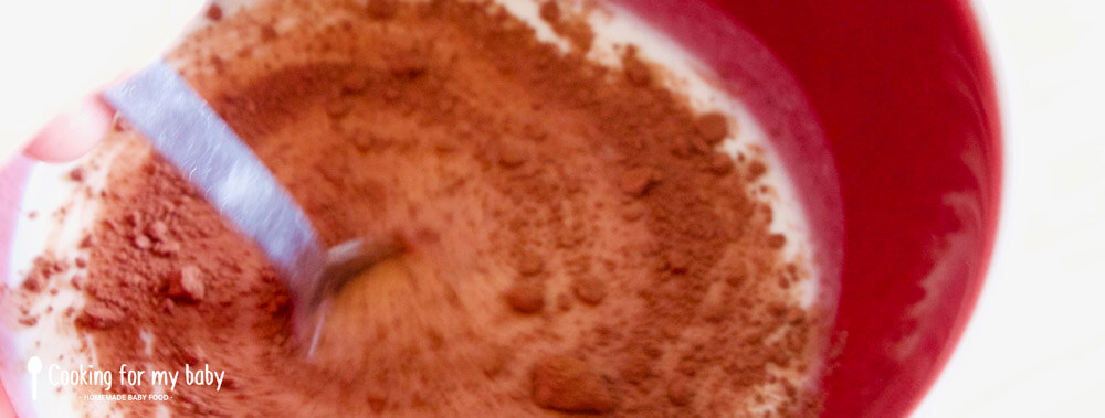 Mixing cocoa into baby waffle batter