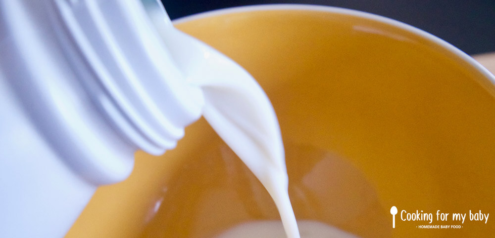 Pouring milk into baby waffle batter