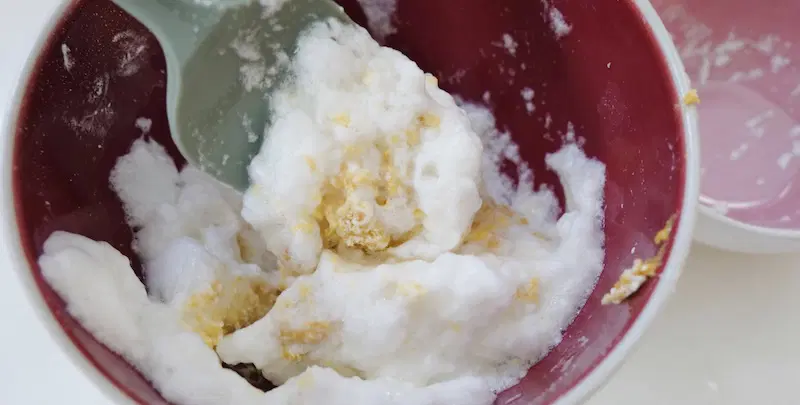 Gently fold the biscuit batter